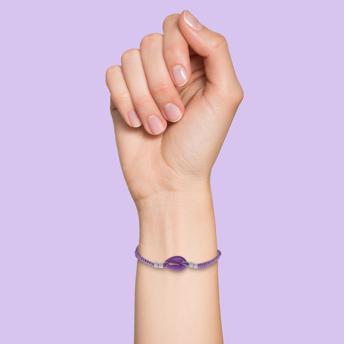 Whirlybird Purple Braided Lifestyle Bracelet With A Purple Shell Charm