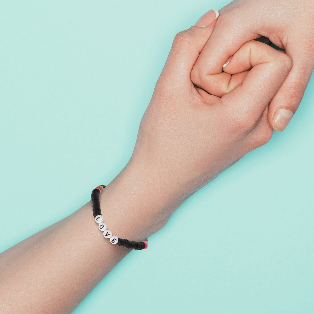 Whirlybird Black And Multicoloured Lifestyle Bracelet With White Beads That Spell 'Love'