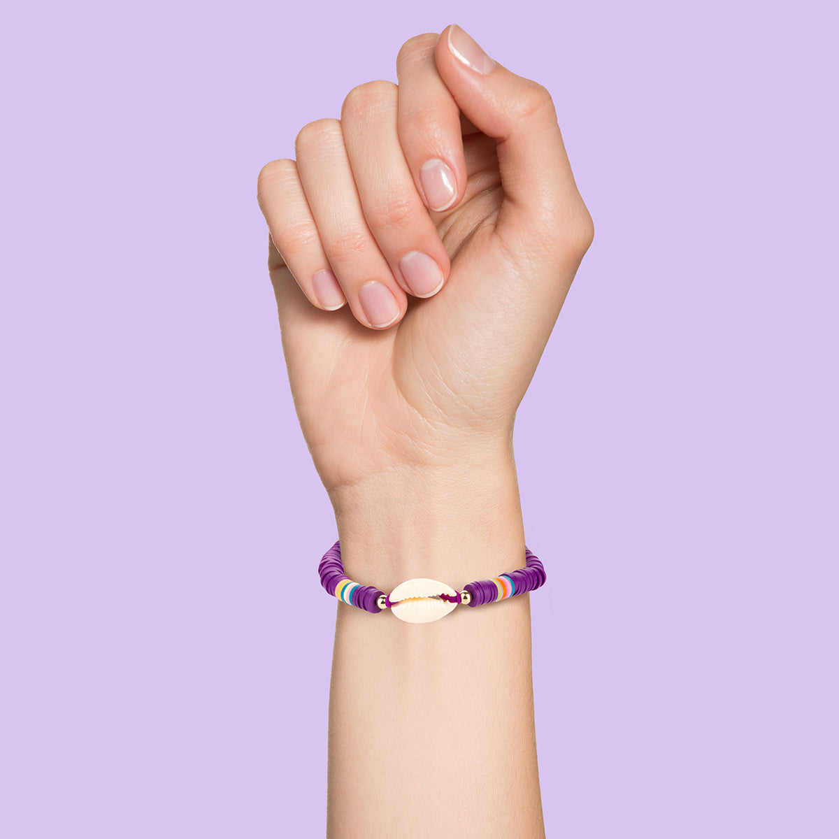 Whirlybird Purple Lifestyle Bracelet With Multicoloured Beads And A white Shell Charm