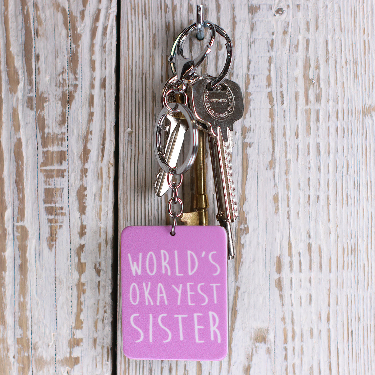 IS002 - Keyring "Okayest Sister"