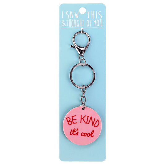 A KEYRING SAYING 'BE KIND IT'S COOL'