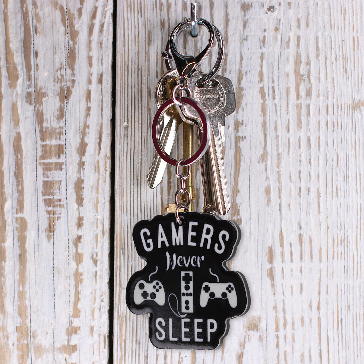IS51 - Keyring "Games Never Sleep"