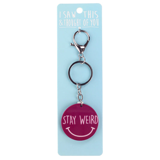 A KEYRING SAYING 'STAY WEIRD'