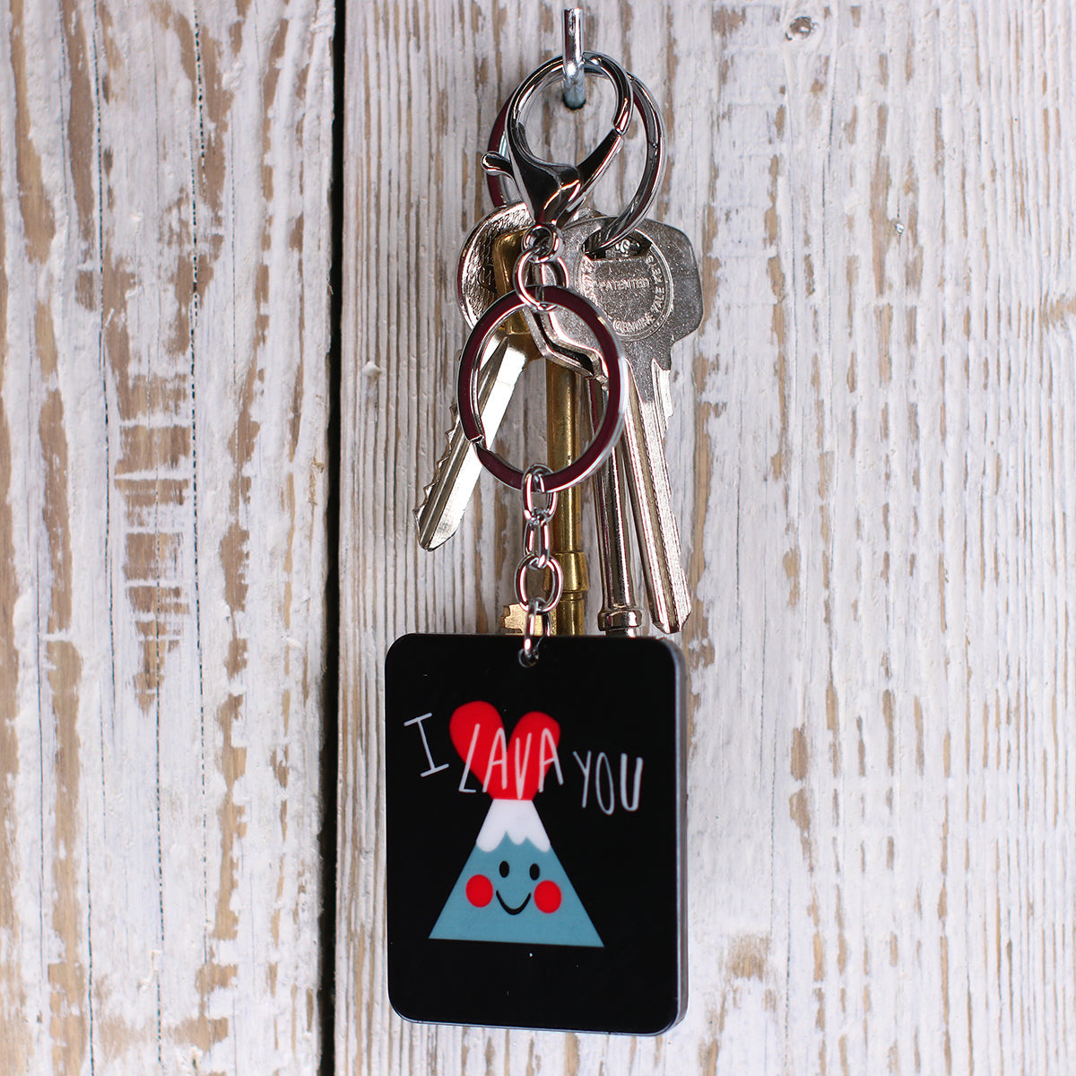 Black Rectangle Keyring With 'I Lava You' And A Smiling Volcano