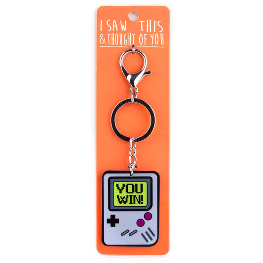 A KEYRING SAYING 'YOU WIN'