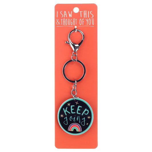 A KEYRING SAYING 'KEEP GOING'