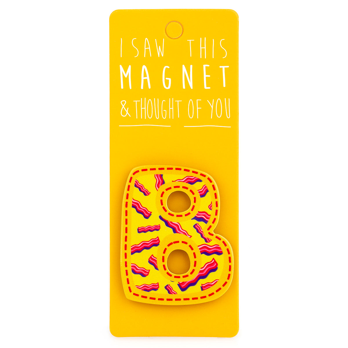 A fridge magnet saying 'B'