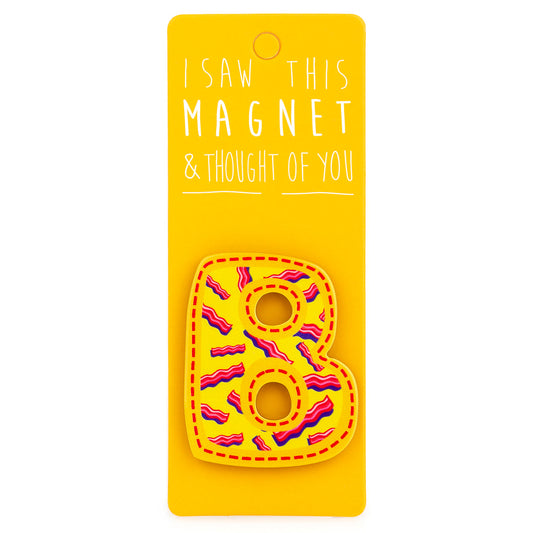 A fridge magnet saying 'B'