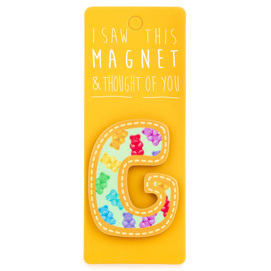 A fridge magnet saying 'G'