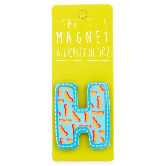 A fridge magnet saying 'H'