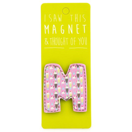 A fridge magnet saying 'M'