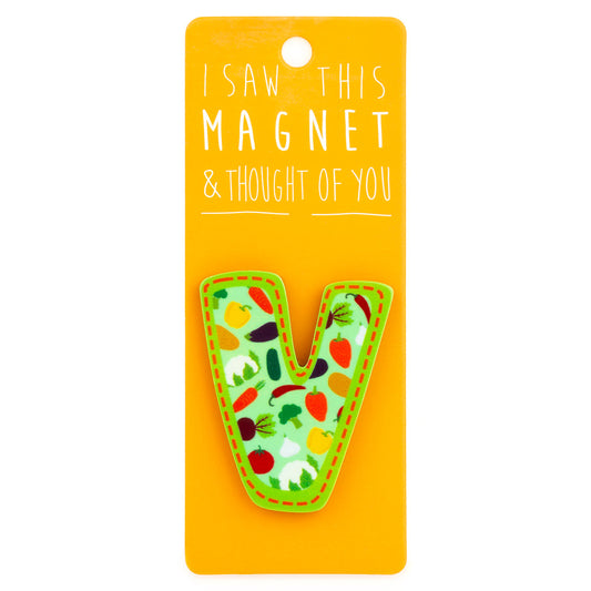 A fridge magnet saying 'V'