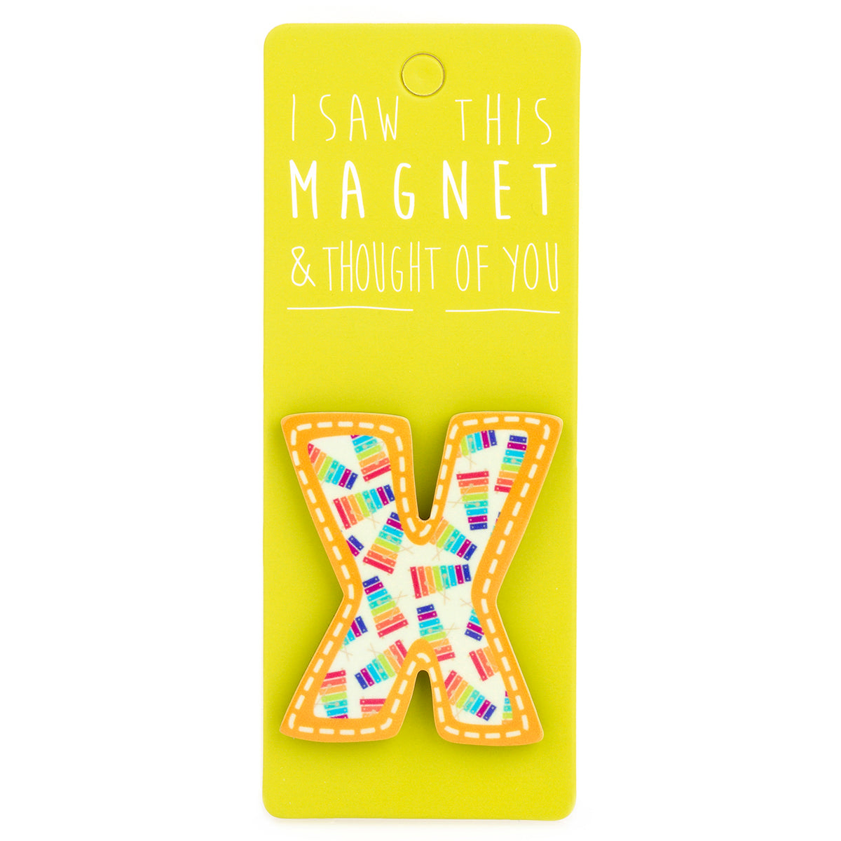 A fridge magnet saying 'X'