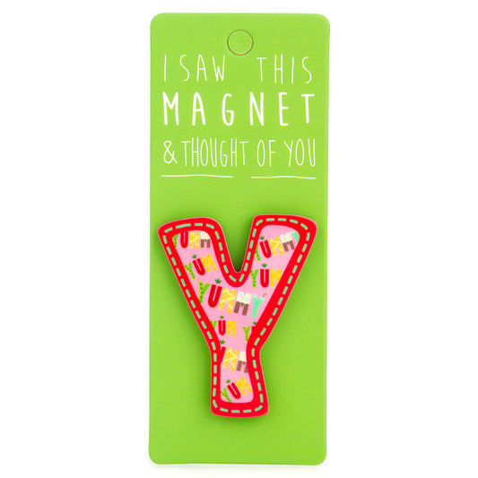 A fridge magnet saying 'Y'