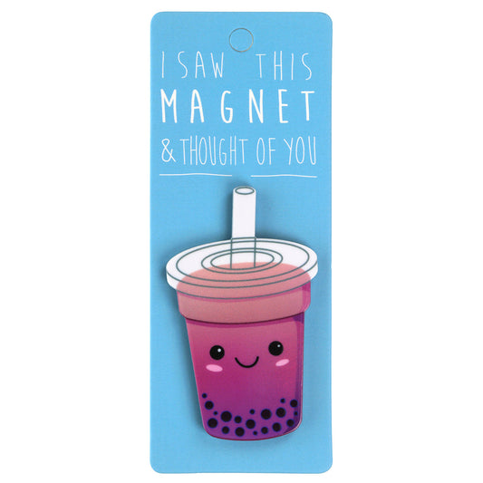 A fridge magnet saying 'Cosmopolitan'