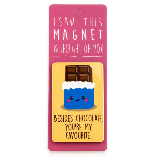 A fridge magnet saying 'Besides Chocolate'