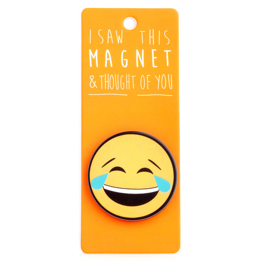 A fridge magnet saying 'Crying Laughing'