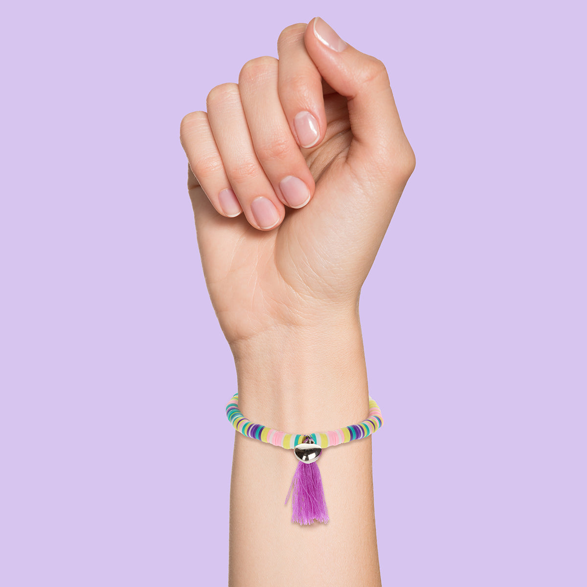 Whirlybird Multicoloured Beaded Lifestyle Bracelet With A Silver Heart Charm And A Purple Tassel